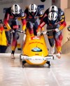 Francesco Friedrich, Candy Bauer, Martin Grothkopp and Alexander Schueller from Germany in action in the first run of the four-men bob world cup in Schoenau, Germany, Sunday, Jan.26, 2020. ( Sven Hoppe/dpa via AP)