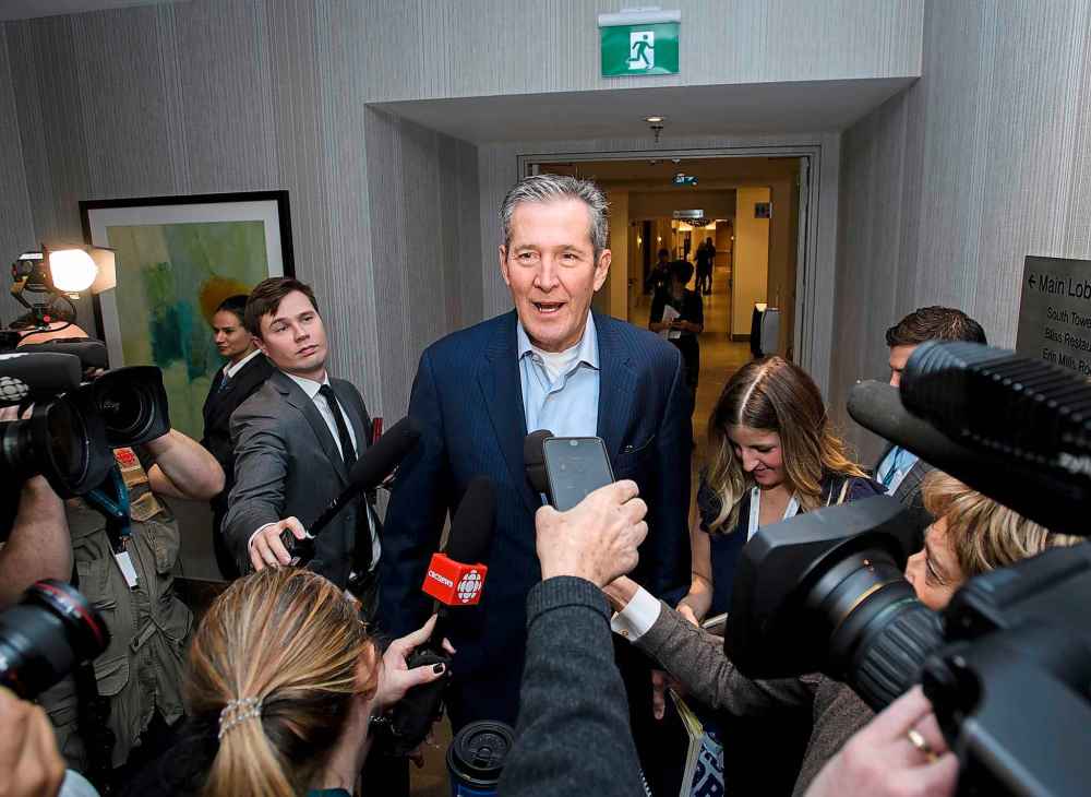 CP
Brian Pallister, Premier of Manitoba, arrives during a meeting of the Council of the Federation which bring together all 13 provincial and territorial Premiers. (Nathan Denette / Canadian Press)