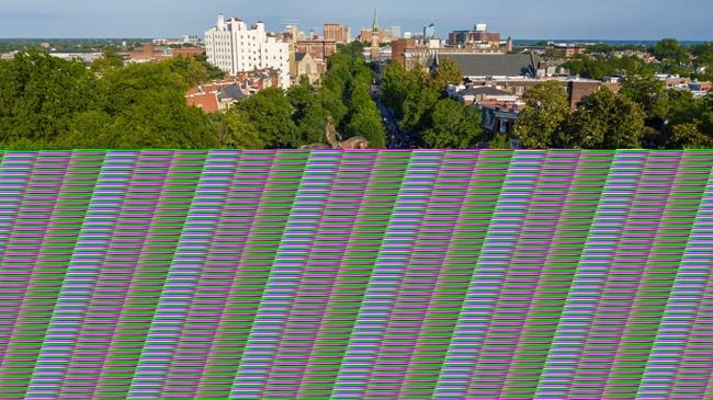 FILE - This Tuesday, June 2, 2020 file photo shows a large group of protesters gather around the statue of Confederate General Robert E. Lee on Monument Avenue near downtown in Richmond, Va. Virginia Gov. Ralph Northam is expected to announce plans Thursday for the removal of an iconic statue of Confederate Gen. Robert E. Lee from Richmond's prominent Monument Avenue. (AP Photo/Steve Helber, File)
