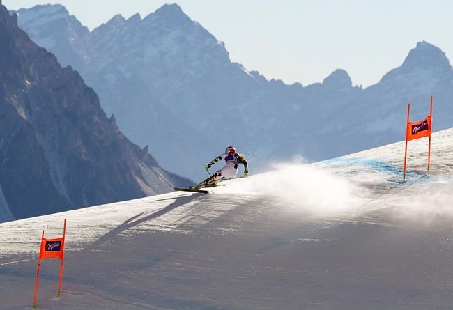 FILE - In this Jan. 27, 2017 file photo, United States's Lindsey Vonn speeds down the course during an alpine ski, women's World Cup downhill training, in Cortina d'Ampezzo, Italy. Having retired from racing in 2019, Vonn is offering her thoughts on the 2021 world championships in Cortina in a diary with the Associated Press. (AP Photo/Alessandro Trovati, file)