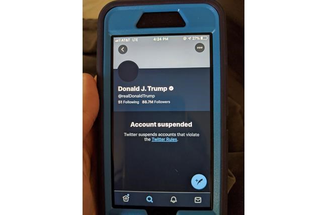 This Friday, Jan. 8, 2021 image shows the suspended Twitter account of President Donald Trump. On Friday, the social media company permanently suspended Trump from its platform, citing