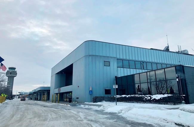The north terminal at Ted Stevens Anchorage International Airport in Anchorage, Alaska, where a flight plane carrying U.S. citizens being evacuated from Wuhan, China is expected later Tuesday, is seen Tuesday, Jan. 28, 2020. (AP Photo/Mark Thiessen)