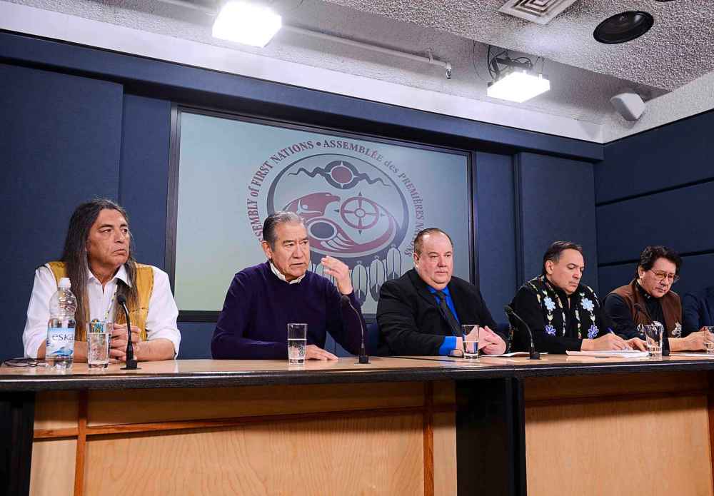 CP
Mohawk Council of Kahnawake Grand Chief Joseph Norton (second from left) is joined by First Nations leaders as they discusses the situation and actions relating to the Wet'suwet'en people during a press conference at the National Press Theatre in Ottawa on Tuesday. (Sean Kilpatrick / The Canadian Press)