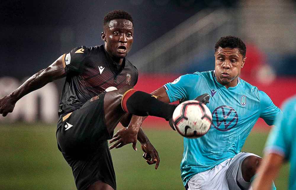 PHIL HOSSACK / WINNIPEG FREE PRESS FILES
Raphael Ohin kicks the ball ahead of Pacific FC player at IG Field during match last July.