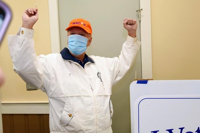 Republican U.S. Sen. Lindsey Graham reacts after marking his ballot electronically while voting in the general election, Tuesday, Nov. 3, 2020, at the Corinth-Shiloh Fire Dept. in Seneca, S.C. (AP Photo/Richard Shiro)