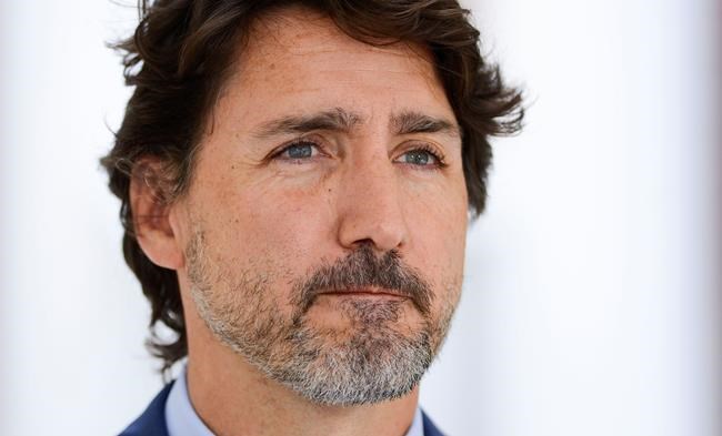 Prime Minister Justin Trudeau holds a press conference at Rideau Cottage amid the COVID-19 pandemic in Ottawa on Monday, July 13, 2020. THE CANADIAN PRESS/Sean Kilpatrick