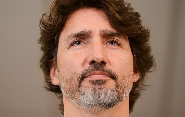 Prime Minister Justin Trudeau holds a press conference as he visits the Public Health Agency of Canada during the COVID-19 pandemic in Ottawa on Friday, July 31, 2020. THE CANADIAN PRESS/Sean Kilpatrick
