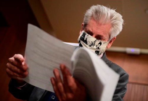 NDP MP Charlie Angus speaks to reporters as he thumbs through a document following a press conference on Parliament Hill in Ottawa on Tuesday, Sept. 1, 2020. THE CANADIAN PRESS/Sean Kilpatrick