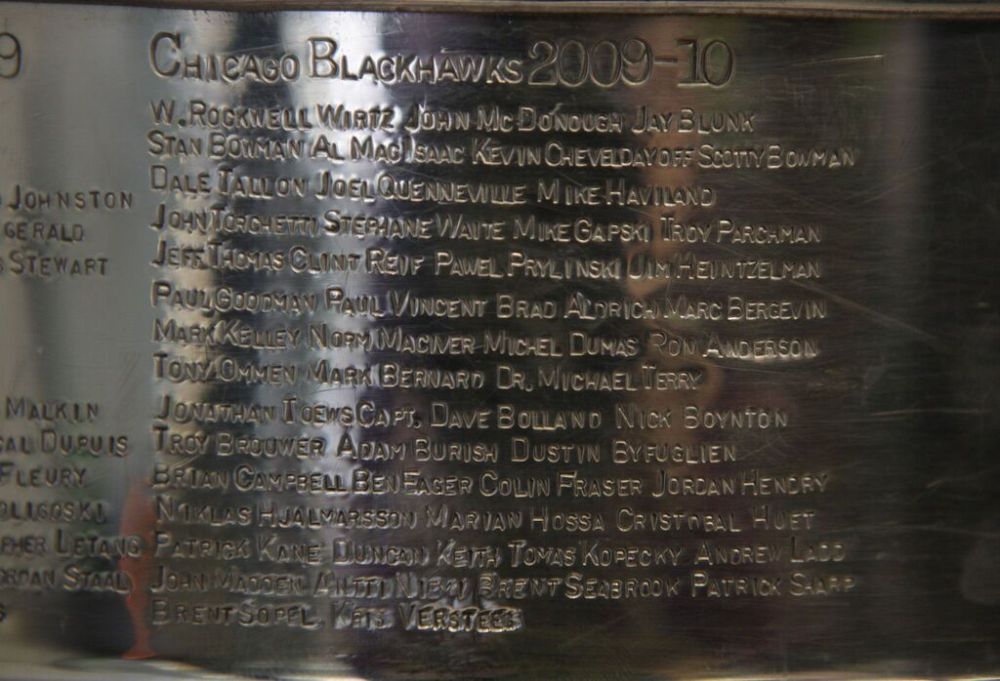 Tribune Media TNS
The names of the staff and players of the Chicago Blackhawks team that won the Stanley Cup in 2010 are engraved on the trophy. (Nancy Stone / Chicago Tribune files)