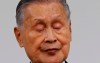 Yoshiro Mori, the president of the Tokyo Olympic organizing committee, closes his eyes during a news conference in Tokyo Thursday, Feb. 4, 2021. (Kim Kyung-hoon/Pool Photo via AP)