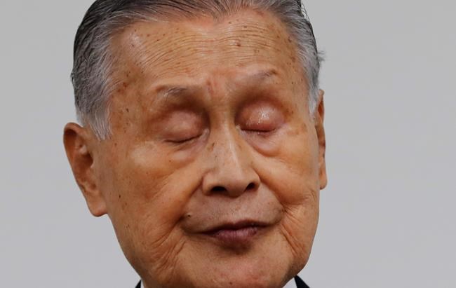 Yoshiro Mori, the president of the Tokyo Olympic organizing committee, closes his eyes during a news conference in Tokyo Thursday, Feb. 4, 2021. (Kim Kyung-hoon/Pool Photo via AP)
