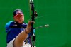 FILE -In this Sept. 14, 2016, file photo, Matt Stutzman, of United States, holds the bow with his foot as he competes in the individual compound-open, during the Paralympic Games at the Sambadrome, in Rio de Janeiro, Brazil. Stutzman is among several Paralympic athletes who are profiled in the Nexflix documentary “Rising Phoenix” that will be released in 190 countries on Wednesday, Aug. 26, 2020.(AP Photo/Silvia Izquierdo, File)