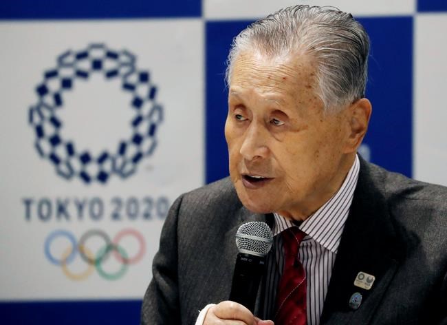 Tokyo 2020 Organizing Committee President Yoshiro Mori delivers a speech during the Tokyo 2020 Executive Board Meeting in Tokyo, Japan Monday, March 30, 2020. Mori said Monday he expects to talk with IOC President Thomas Bach this week about rescheduling the games for next year. (Issei Kato/Pool Photo via AP)