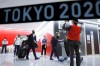 The Olympic athletes from the United States arrive at Narita International Airport in Narita, east of Tokyo, on July 1, 2021. Tens of thousands of visiting athletes, officials and media are descending on Japan for a Summer Olympics unlike any other. There will be no foreign fans, no local fans in Tokyo-area venues. A surge of virus cases has led to yet another state of emergency. (Kyodo News via AP)