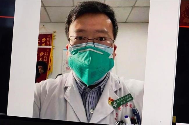 This image from video, shows a selfie of Dr. Li Wenliang. The Chinese doctor who got in trouble with authorities in the communist country for sounding an early warning about the coronavirus outbreak died Friday, Feb. 7, 2020, after coming down with the illness. The Wuhan Central Hospital said on its social media account that Dr. Li, a 34-year-old ophthalmologist, was “unfortunately infected during the fight against the pneumonia epidemic of the new coronavirus infection.” (AP Photo)