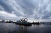 FILE - This April 12, 2021, file photo shows the Olympic rings floating in the water in the Odaiba section in Tokyo. Some nurses in Japan are incensed at a request from Tokyo Olympic organizers to have 500 of them dispatched to help out with the games. They say they’re already near the breaking point dealing with the coronavirus pandemic. A protest message saying that nurses were opposed to holding the Olympic went viral on Japanese Twitter recently, being retweeted hundreds of thousands of times. (AP Photo/Eugene Hoshiko, File)