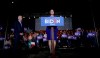 Democratic presidential candidate former Vice President Joe Biden, left, is joined by former rival Sen. Amy Klobuchar, right, as she endorses Biden during a campaign stop in Dallas, Monday, March 2, 2020. (AP Photo/Eric Gay)