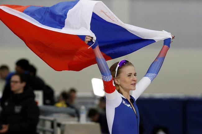 Russia's Natalia Voronina celebrates after competing in the women's 5,000 meters during the world single distances speedskating championships Saturday, Feb. 15, 2020, in Kearns, Utah. (AP Photo/Rick Bowmer)