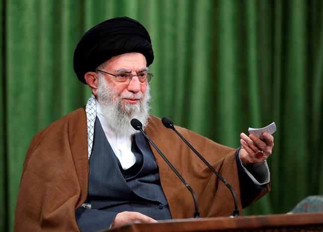 In this picture released by an official website of the office of the Iranian supreme leader, Supreme Leader Ayatollah Ali Khamenei addresses the nation in a televised speech marking the birthday of Islam's Prophet Muhammad, in Tehran, Iran, Tuesday, Nov. 3, 2020. Iran’s supreme leader mocked America’s presidential election in a televised address. In his remarks Tuesday, Khamenei quoted President Donald Trump’s own baseless claims about voter fraud to criticize the vote as Tehran marked the 1979 U.S. Embassy hostage crisis. (Office of the Iranian Supreme Leader via AP)