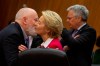 European Commissioner for European Green Deal Frans Timmermans, left, greets European Commission President Ursula von der Leyen prior to an extraordinary meeting of the EU college of commissioners at EU headquarters in Brussels, Wednesday, Jan. 8, 2020. European Union foreign policy chief Josep Borrell is expected to brief the college on Wednesday regarding the current situation in Libya and Iran. (AP Photo/Virginia Mayo)
