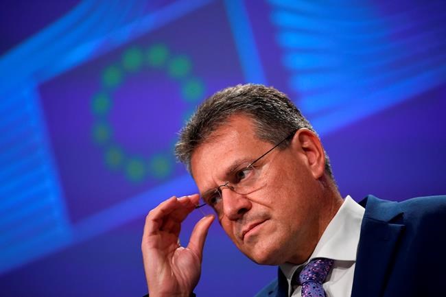 Vice-President of the European Commission in charge of Inter-institutional relations and Foresight, Maros Sefcovic, speaks during a media conference after the third meeting of the EU-UK Joint Committee at EU headquarters in Brussels, Monday, Sept. 28, 2020. Britain entered a crucial week of talks with the EU by immediately snubbing the EU's demand that London must fully respect the legal agreement it signed on its departure from the bloc. The EU told Prime Minister Boris Johnson to brace for a legal fight. (John Thys, Pool via AP)