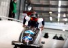 United State's bobsleigh pilot Kaillie Humphries at the start of the women's monobob race at the Bobsleigh and Skeleton World Championships in Altenberg, Germany, Saturday, Feb.13, 2021. (AP Photo/Matthias Schrader)