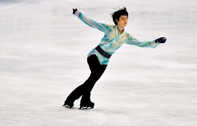 CAPTION CORRECTS THE ID - Yuzuru Hanyu of Japan performs during the Men Free Skating Program at the Figure Skating World Championships in Stockholm, Sweden, Saturday, March 27, 2021. (AP Photo/Martin Meissner)