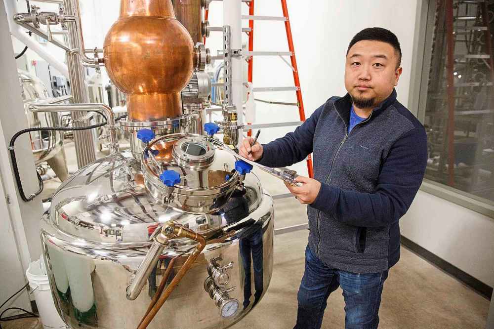MIKE DEAL / WINNIPEG FREE PRESS
Jason Kang the owner of award winning distillery Capital K which has been producing vodka and gin for about three years at their location on Dublin Avenue.