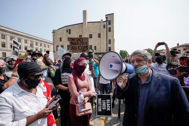 Kenosha Mayor John Antaramian tries to speak to protesters Monday, Aug. 24, 2020, in Kenosha, Wis. (AP Photo/Morry Gash)