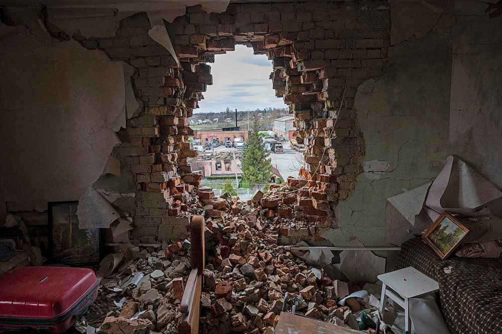 Debris lies in a war damaged apartment on April 19, 2022, in Makarov, Ukraine. Local residents said the building was attacked by Russian tanks during the invasion in early March. (John Moore/Getty Images/TNS)