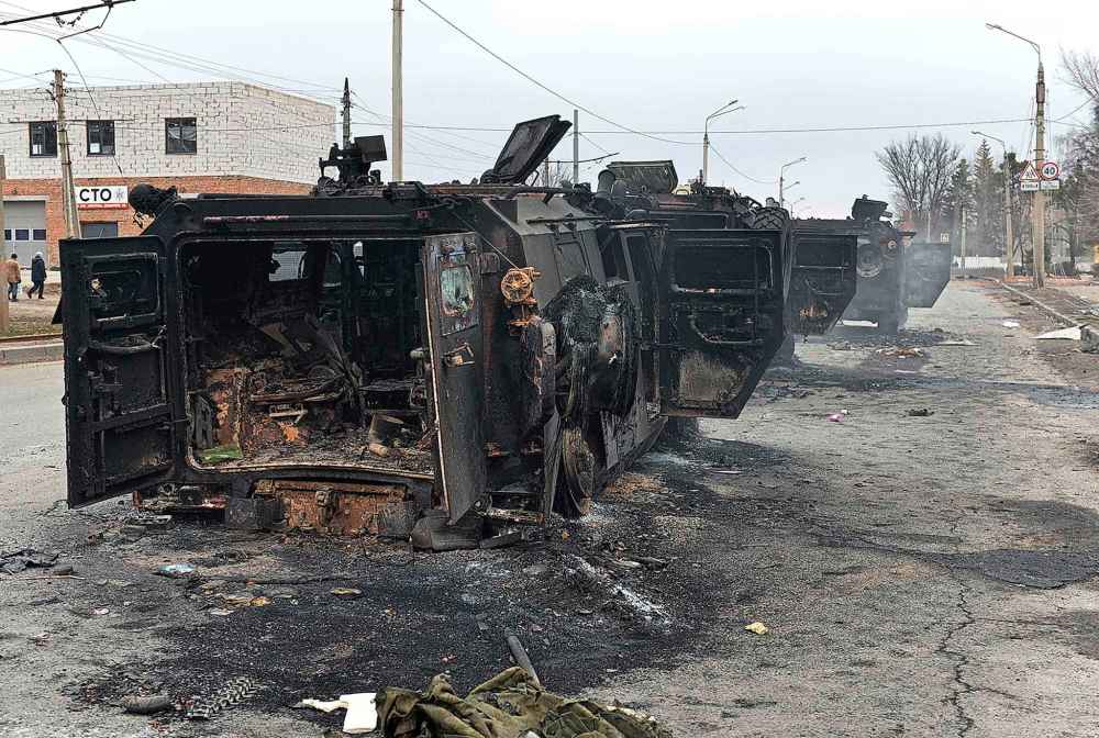 This picture shows Russian infantry mobility vehicles GAZ Tigr destroyed as a result of fight in Kharkiv, located some 50 km from Ukrainian-Russian border, on Feb. 28, 2022. (Sergey Bobok/AFP via Getty Images/TNS)