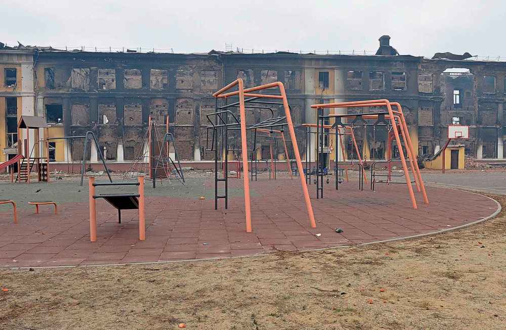 This photograph shows a view of a school destroyed as a result of fight not far from the center of Ukrainian city of Kharkiv, located some 50 km from Ukrainian-Russian border, on Feb. 28, 2022. (Sergey Bobok/AFP via Getty Images/TNS)