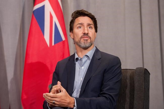 Prime Minister Justin Trudeau speaks to media while meeting with Manitoba Premier, Brian Pallister during the Liberal Cabinet Retreat at the Fairmont Hotel in Winnipeg, Monday, Jan. 20, 2020. THE CANADIAN PRESS/Mike Sudoma
