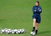 FILE - In this file photo dated Sunday, Feb. 28 2010, Hege Riise, from Norway, assistant coach of the United States Women's Soccer team, watches the players during a training session, in Guia, southern Portugal. Hege Riise will temporarily take over as coach of the England women’s national soccer team following Phil Neville’s departure. (AP Photo/Armando Franca, FILE)
