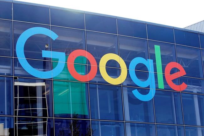 FILE - In this Sept. 24, 2019, file photo a sign is shown on a Google building at their campus in Mountain View, Calif. The Justice Department is expected to file a lawsuit Tuesday alleging that Google has been abusing its online dominance in online search to stifle competition and harm consumers. The litigation marks the government’s most significant act to protect competition since its groundbreaking case against Microsoft more than 20 years ago. The suit could be an opening salvo ahead of other major government antitrust actions, given ongoing investigations of major tech companies including Apple, Amazon and Facebook at both the Justice Department and the Federal Trade Commission. (AP Photo/Jeff Chiu, File)