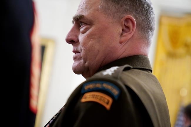 FILE - In this Sept. 11, 2020, file photo Chairman of the Joint Chiefs of Staff Gen. Mark Milley arrives for the presentation of the Medal of Honor to Army Sgt. Maj. Thomas P. Payne in the East Room of the White House in Washington. A Princeton-educated history buff with the gift of gab, Milley has been a staunch defender of the military’s apolitical tradition even as President Donald Trump packed the Pentagon with political loyalists. (AP Photo/Andrew Harnik, File)