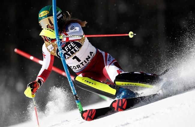 Austria's Katharina Liensberger competes during a women's slalom, at the alpine ski World Championships in Cortina d'Ampezzo, Italy, Saturday, Feb. 20, 2021. (AP Photo/Gabriele Facciotti)