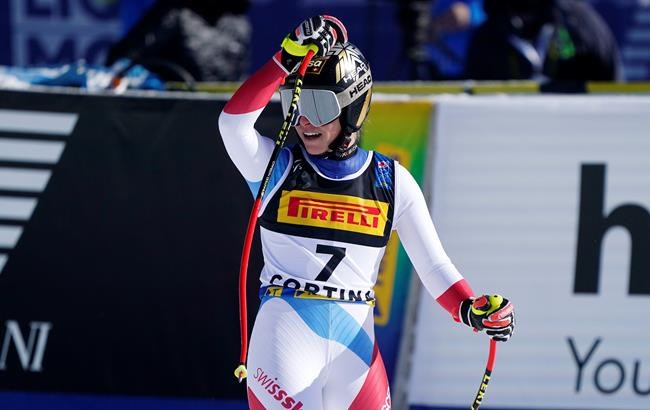Switzerland's Lara Gut-Behrami reacts as she arrives at the finish area during the women's super-G, at the alpine ski World Championships in Cortina d'Ampezzo, Italy, Thursday, Feb. 11, 2021. (AP Photo/Giovanni Auletta)