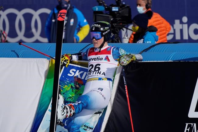 United States' River Radamus reacts after completing a men's giant slalom, at the alpine ski World Championships, in Cortina d'Ampezzo, Italy, Friday, Feb. 19, 2021. (AP Photo/Giovanni Auletta)