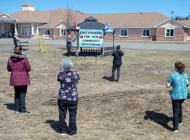 Workers at an extended care facility show their community support in Debert, N.S. on Tuesday, April 21, 2020. THE CANADIAN PRESS/Andrew Vaughan