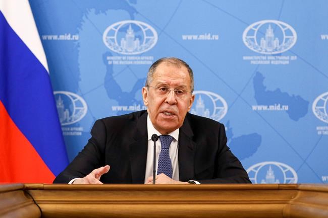 In this handout photo released by Russian Foreign Ministry Press Service, Russian Foreign Minister Sergey Lavrov speaks during his annual news conference in Moscow, Russia, Monday, Jan. 18, 2021. Lavrov said Monday the stream of reactions to Navalny's arrest by Western officials reflects an attempt