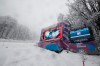Writing on a giant screen announced that an alpine ski, women's World Cup downhill training is canceled due to heavy snow, in Rosa Khutor, Russia, Friday, Jan. 31, 2020. (AP Photo/Gabriele Facciotti)