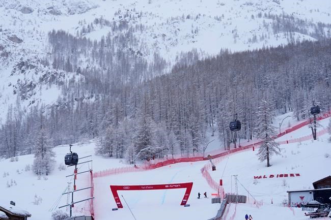 A view of an empty course after an alpine ski, women's World Cup downhill was canceled, in Val D'Isere, France, Saturday, Dec. 21, 2019. (AP Photo/Giovanni Auletta)