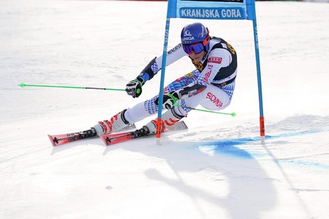 Slovakia's Petra Vlhova competes in an alpine ski, women's World Cup giant slalom, in Kranjska Gora, Slovenia, Saturday, Feb. 15, 2020. (AP Photo/Giovanni Auletta)