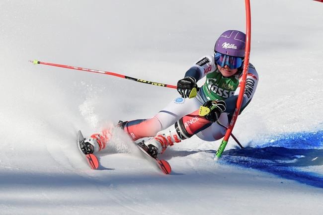 France's Tessa Worley competes in an alpine ski, women's World Cup giant slalom, in Lienz, Austria, Saturday, Dec. 28, 2019. (AP Photo/Piermarco Tacca)