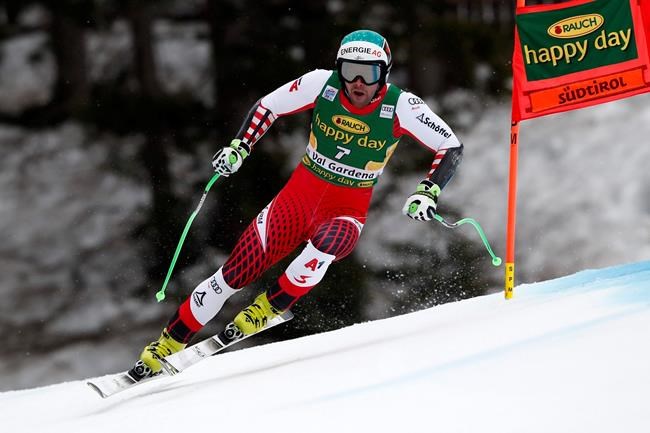 Austria's Vincent Kriechmayr competes during an alpine ski, men's World Cup Super G, in Val Gardena, Italy, Friday, Dec. 20, 2019. (AP Photo/Gabriele Facciotti)