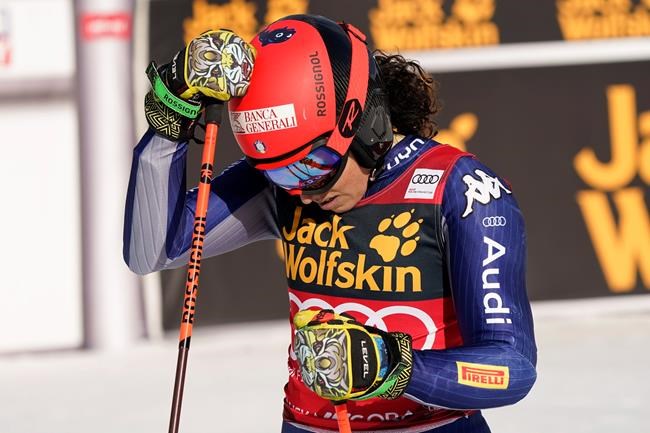 Italy's Federica Brignone reacts at the finish area of an alpine ski, women's World Cup giant slalom, in Kranjska Gora, Slovenia, Saturday, Feb. 15, 2020. (AP Photo/Giovanni Auletta)