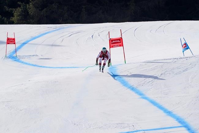 Austria's Vincent Kriechmayr arrives at the finish area of an alpine ski, men's World Cup super G, in Saalbach-Hinterglemm, Austria, Sunday, March 7, 2021. (AP Photo/Giovanni Auletta)