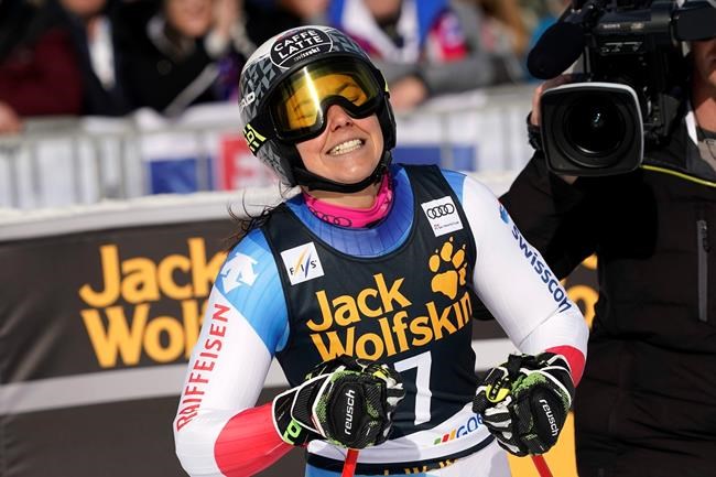 Switzerland's Wendy Holdener celebrates at the finish area of an alpine ski, women's World Cup giant slalom, in Kranjska Gora, Slovenia, Saturday, Feb. 15, 2020. (AP Photo/Giovanni Auletta)