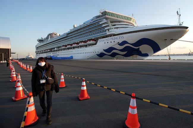 The quarantined cruise ship Diamond Princess anchors at the Yokohama Port, Monday, Feb. 10, 2020, Yokohama, Japan. Japan’s health ministry said Monday that about 60 more people on the quarantined cruise ship have tested positive for a new virus. (AP Photo/Eugene Hoshiko)